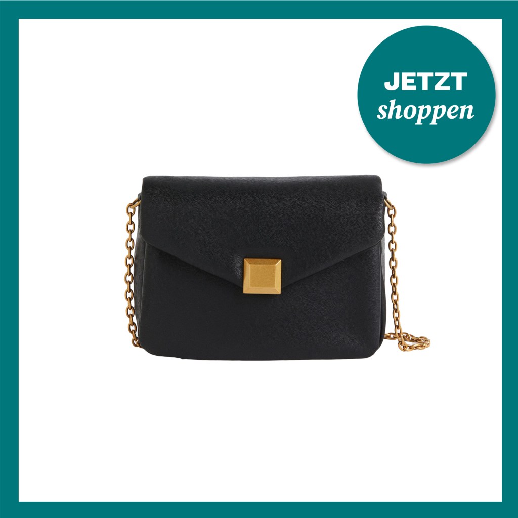 Schwarze Tasche von H&M mit goldenem Kettenhenkel.