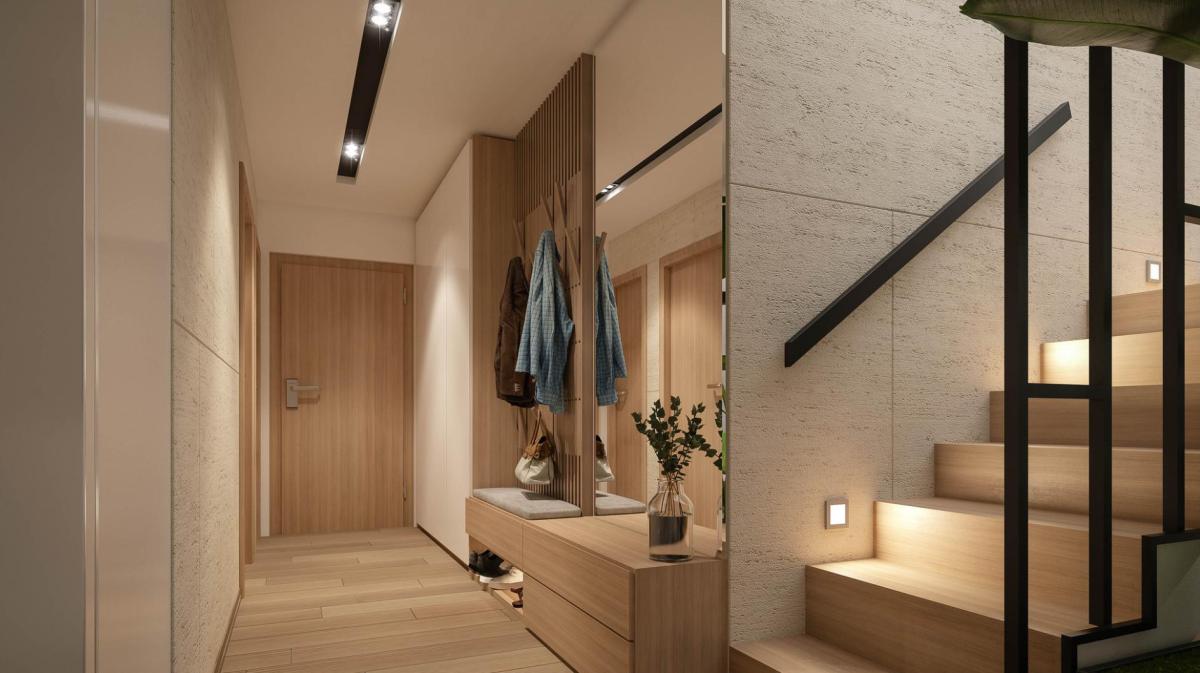 Luxuriöser Hausflur mit einer Garderobe und einem Schrank und einer Treppe in Beigetönen.