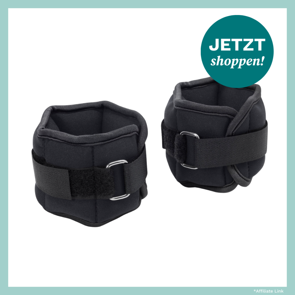 Fitness-Zubeh&ouml;r mit zwei schwarzen Gewichtsmanschetten f&uuml;r Arme oder Beine.