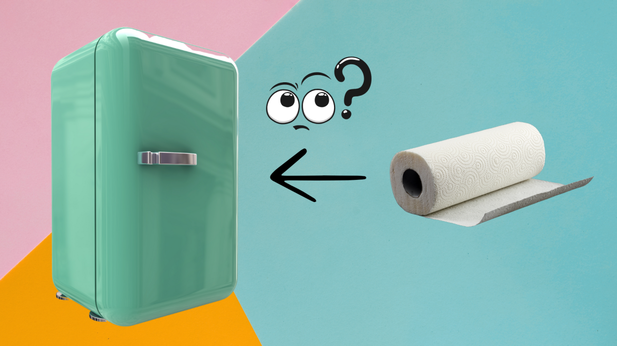 Ein grüner Kühlschrank und eine Küchenrolle vor buntem Hintergrund