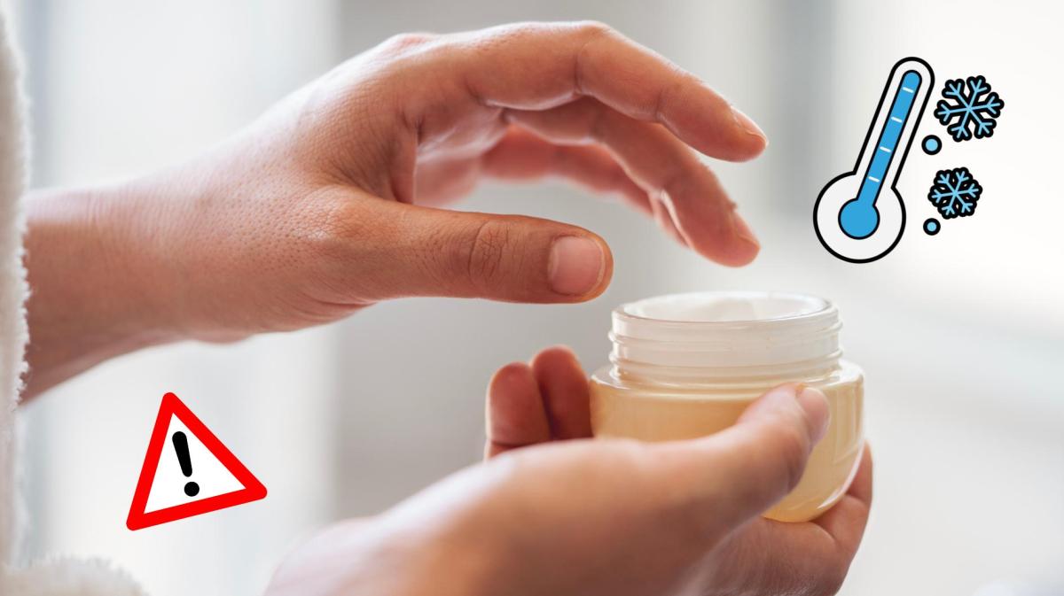 Frau nimmt sich etwas Creme aus einer Cremedose.