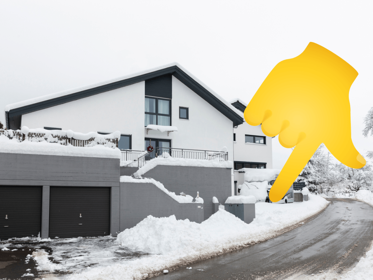 Haus im Winter mit Finger Emoji