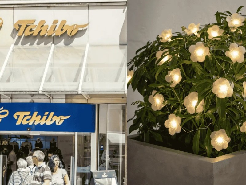 Tchibo Gesch&auml;ft von au&szlig;en, daneben eine Lichterkette.